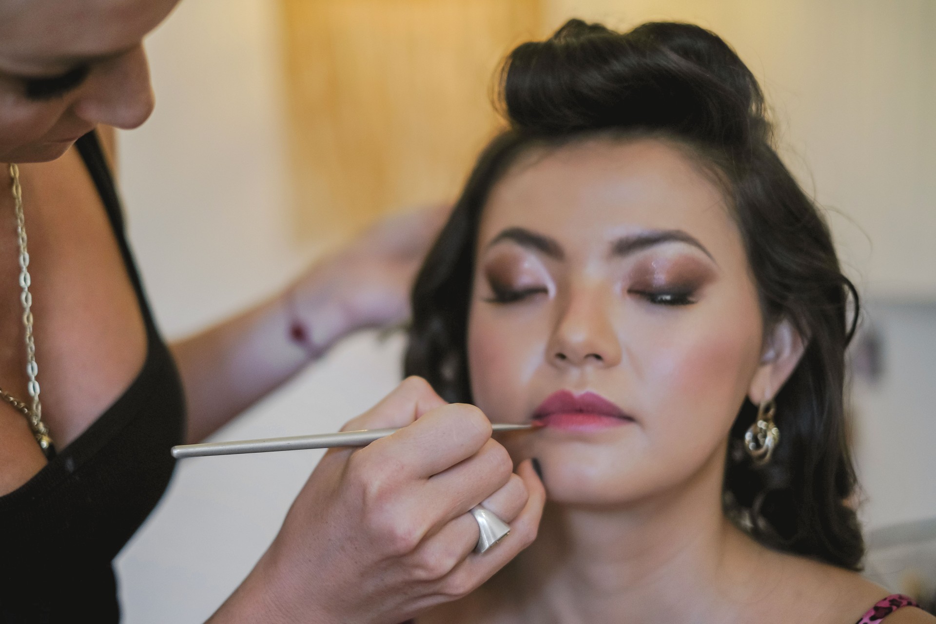Chinese Bride Having Make-up Done Before the Ceremony